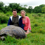 Rod, Christi and a shy giant tortoise, highlands of Santa Cruz Island Galapagos Islands Ecuador Rod, Christi and a shy giant tortoise, highlands of Santa Cruz Island Galapagos Islands Ecuador