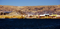 Uros Islands and modern Puno, Peru
