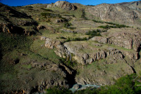 Waterfall plunges into Rio Fitz Roy, Laguna Torre trail, Los Glaciares National Park, Argentina