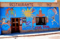 Provocative restaurant mural, Tilcara, Argentina
