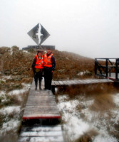 Rod and Christi at the albatross-in-flight statue, Cape Horn, Tierra del Fuego, Chile