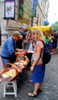 Christi tastes the street food, San Telmo market, Buenos Aires, Argentina