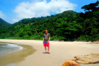 Relaxing on Trindade beach, Costa Verde, Brazil
