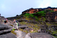 Hiking to the Hotel Indio overhang, summit of the Lost World, Roraima trek, Venezuela Hiking to the Hotel Indio overhang, summit of the Lost World, Roraima trek, Venezuela
