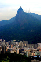 Tiny Christ the Redeemer atop Corcavado mountain, from Sugar Loaf mountain, Rio de Janeiro Tiny Christ the Redeemer atop Corcavado mountain, from Sugar Loaf mountain, Rio de Janeiro