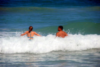 Kelvin and Ashley splashing about in the Caribbean on New Year's Day, Playa El Agua, Margarita Island, Venezuela
