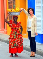 Sneaking a free sample, Chico's women's clothing photo shoot, Cartagena, Colombia