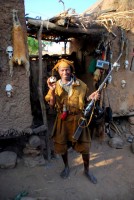 Dogon hunter (with trophies), village of Begnemato, Dogon Country, Mali, Africa Dogon hunter (with trophies), village of Begnemato, Dogon Country, Mali, Africa