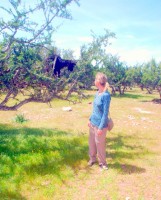 Christi and the goat both seem a little surprised