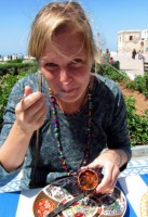Christi loves the sea urchin, Essaouira waterfront, Morocco, Africa