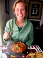 A yummy beef tajine makes Christi a happy girl, Essaouira, Morocco, Africa