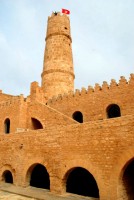 Brian takes a dive off the tower and into a flying saucer, the ribat, Monastir, Tunisia, Africa