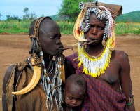 Joining of the lips, Mursi village, Omo valley, Ethiopia, Africa