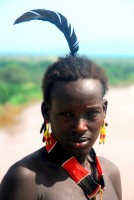 Karo warrior with feather detail, Korcho village, Lower Omo Valley, Ethiopia, Africa