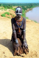 Elderly Karo woman and Omo River, Korcho village, Lower Omo Valley, Ethiopia, Africa