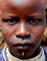 Karo girl with pierced lower lip, Korcho village, Lower Omo Valley, Ethiopia, Africa