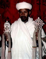 Monk and crosses, Church of St. George, Lalibela, Ethiopia, Africa