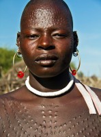 Karamojong warrior, Eastern Uganda, Africa (courtesy www.izlaphotography.com)