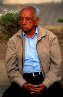 Local Cuenca man watches the world go by