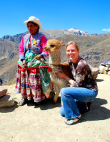 Christi, the alpaca, and its grumpy owner, Peruvian altiplano