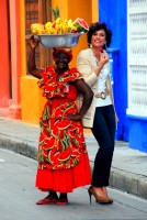Cosmopolitan Cartagena: Carib fruit seller and Amazonian model