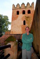 Christi walks the ramparts of the Chefchaouen Kasbah, Morocco, Africa Christi walks the ramparts of the Chefchaouen Kasbah, Morocco, Africa