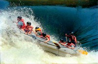 Rafting the Nile at Jinja (note the water level is above the raft!), Uganda, Africa